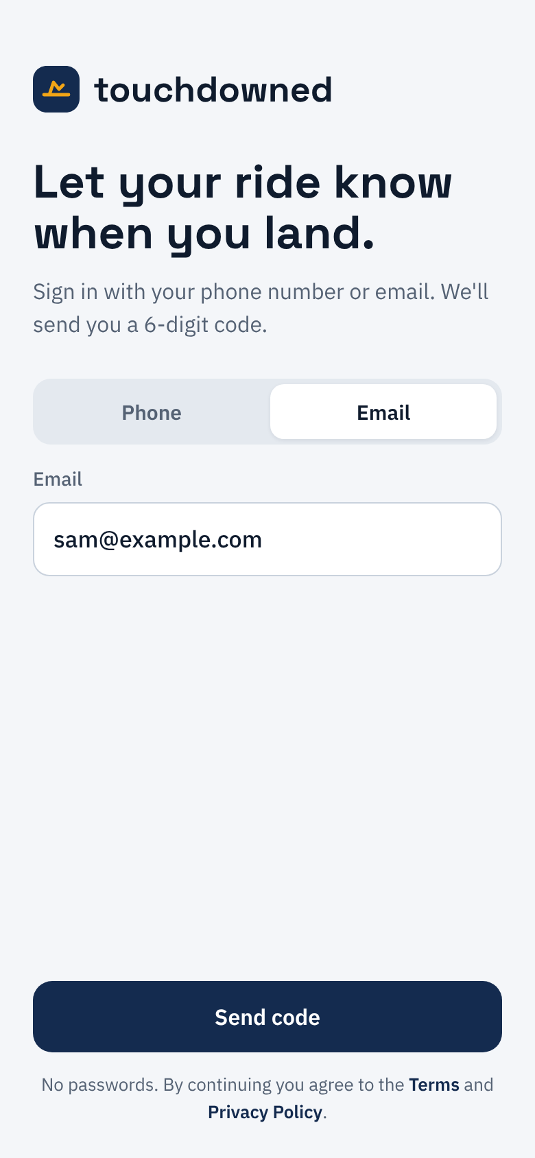The touchdowned sign-in screen with the Email tab selected: an email field, a Send code button, and the same Terms and Privacy Policy links.